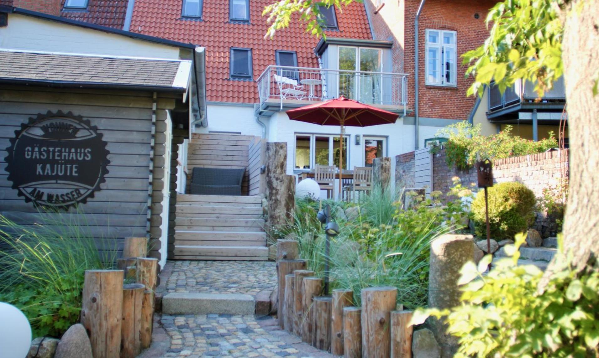 Gastehaus Kajute Direkt Am Wasser Friedrichstadt Buitenkant foto